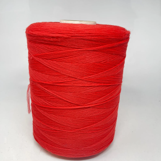 Large red cone of laceweight acrylic yarn, approx. 12.5 inches tall.